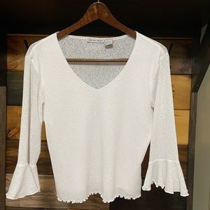 Woman's top/Slightly used, worn twice. Runs small. Front lined/sheer back.